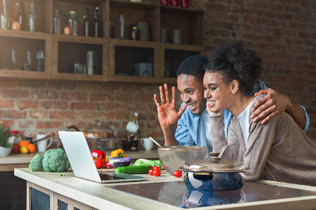 Young couple on Zoom call sharing Saladmaster’s opportunity for extra income, healthy living and non-toxic cookware.