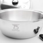 Saladmaster Limited Edition 12 Quart Roaster with lid and removable handles on white benchtop